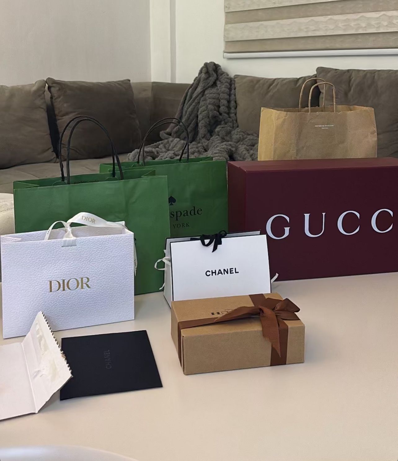 Designer sneaker pair in luxury packaging